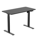 BRATECK Compact Single Motor Electric Sit-Stand Desk with Desktop Included. Width 1200x600mm, Height Range 730-1210mm, Weight Cap 70Kgs, 3 memory Settings, Timer Reminder. Black Colour. - Office Connect 2018