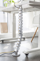 BRATECK Deluxe Cable Management Spine. Great for Height Adjustable Sit-Stand Desk or Stationary Desk Cable Management. Dims 1300x67x35mm Spine Consists of 30 Removable Pieces. Weighted Base. Silver Color - Office Connect 2018