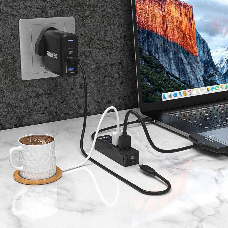 UNITEK USB 3.0 4-Port Hub with USB-C Connector Cable. Includes 4x USB-A Ports, 1x USB-C Power Port 5V 2A. Data Transfer Rate up to 5Gbps. Plug & Play. Black Colour. - Office Connect 2018